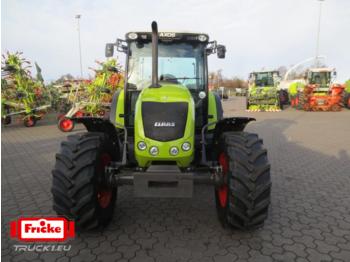 Tracteur agricole CLAAS AXOS 310 C: photos 1