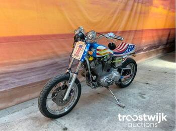Motocyclette Harley davidson XLH 883 Hugger: photos 1