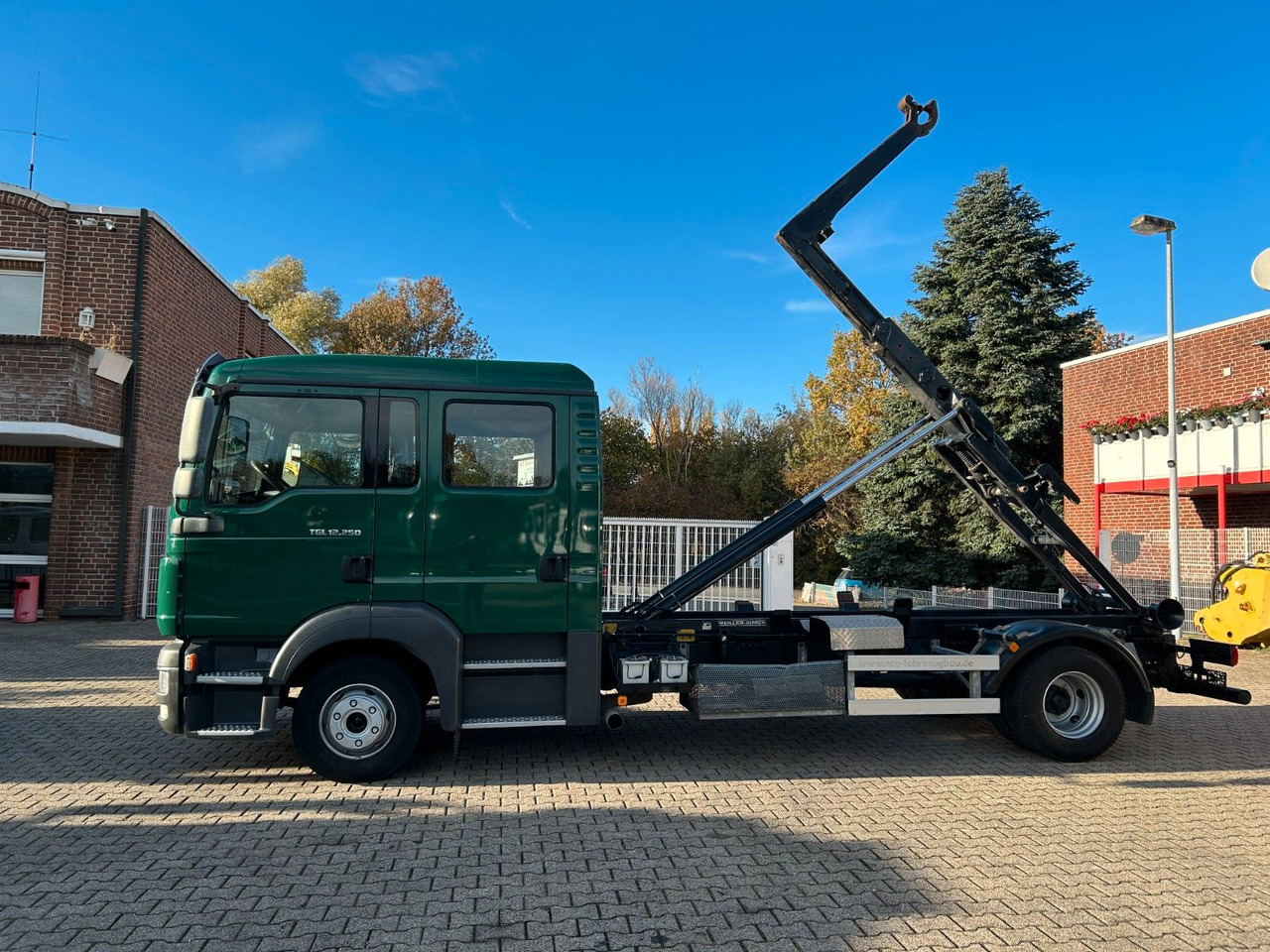 Camion ampliroll MAN 12.250 Doppelkabine Abroller