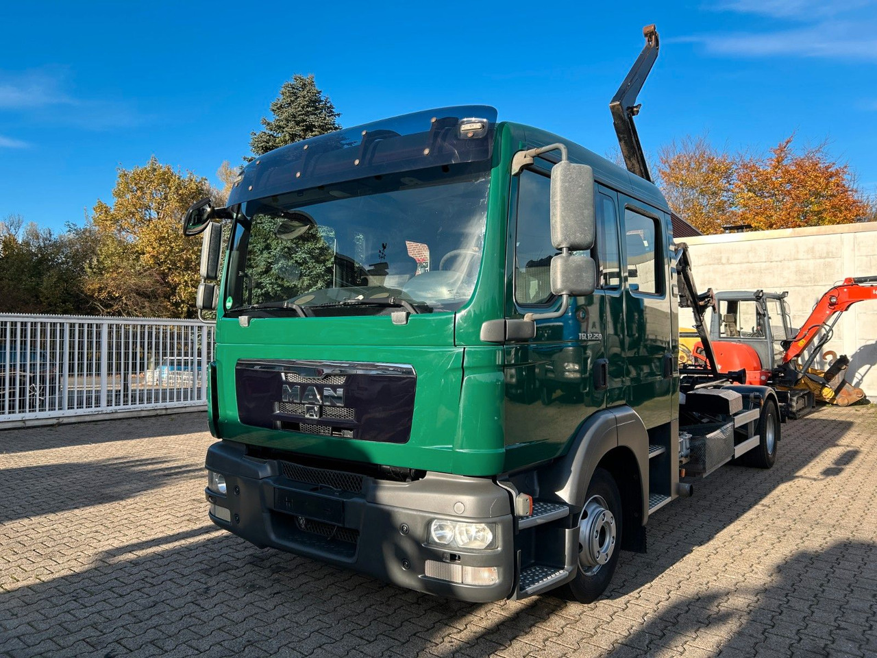 Camion ampliroll MAN 12.250 Doppelkabine Abroller