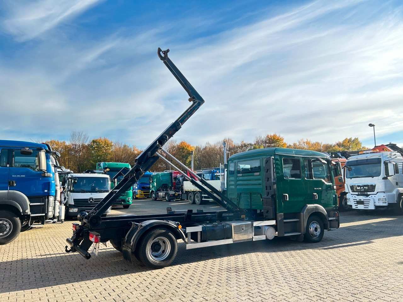 Camion ampliroll MAN 12.250 Doppelkabine Abroller