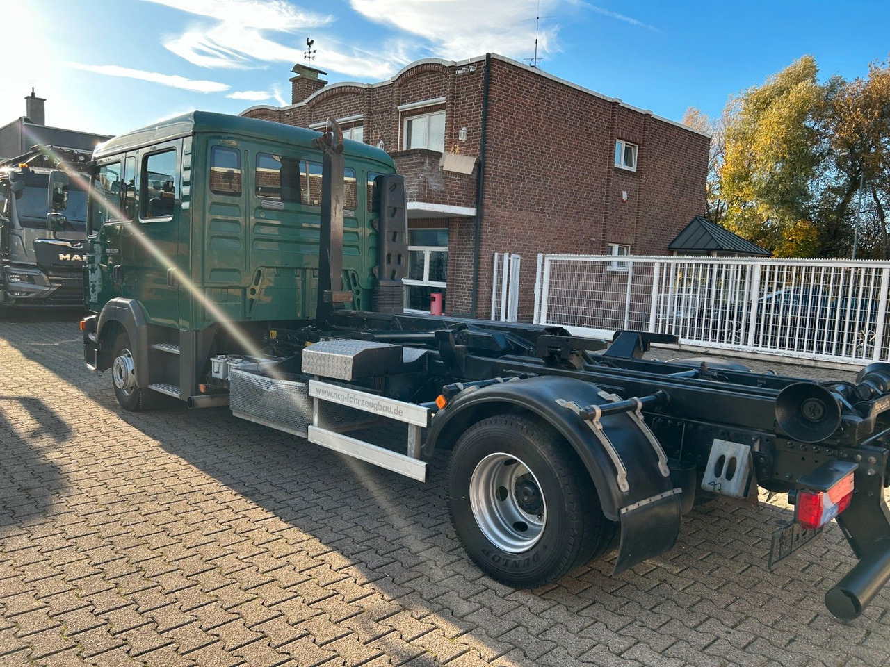 Camion ampliroll MAN 12.250 Doppelkabine Abroller