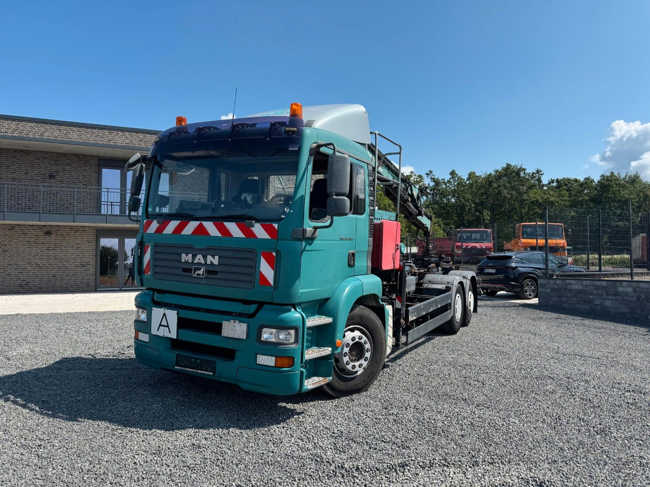 Camion ampliroll MAN TGA 26.360 Kran TeRex Multilift Fernbedienung