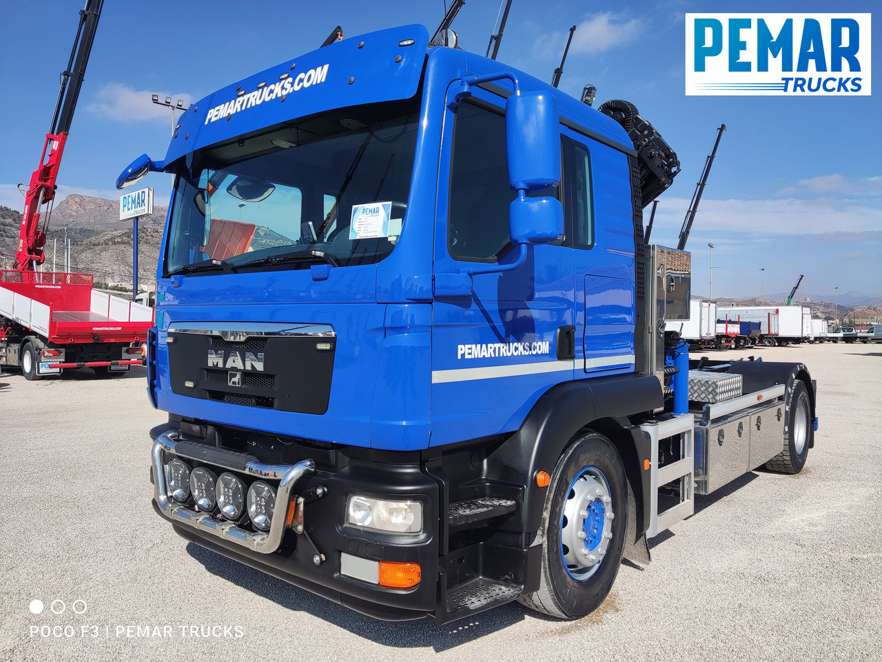 Camion ampliroll MAN TGM 18.290 GRUA MULTILIFT