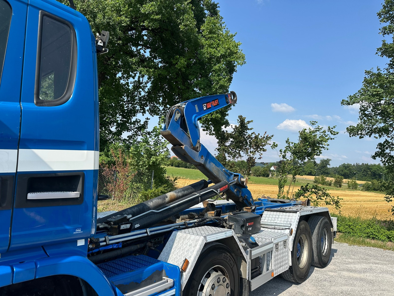 Camion ampliroll SCANIA G450 8x4 Hiab