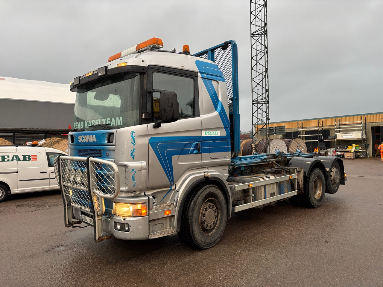 Camion ampliroll Scania R124