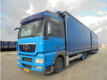 Camion bâche MAN TGX 24-400 6X2