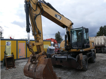 Pelle sur pneus CATERPILLAR 322