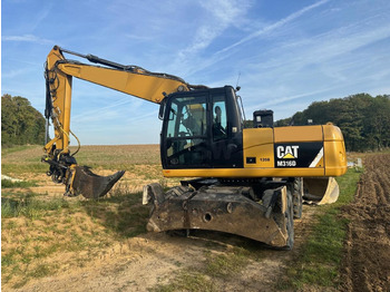 Pelle sur pneus CATERPILLAR M316D