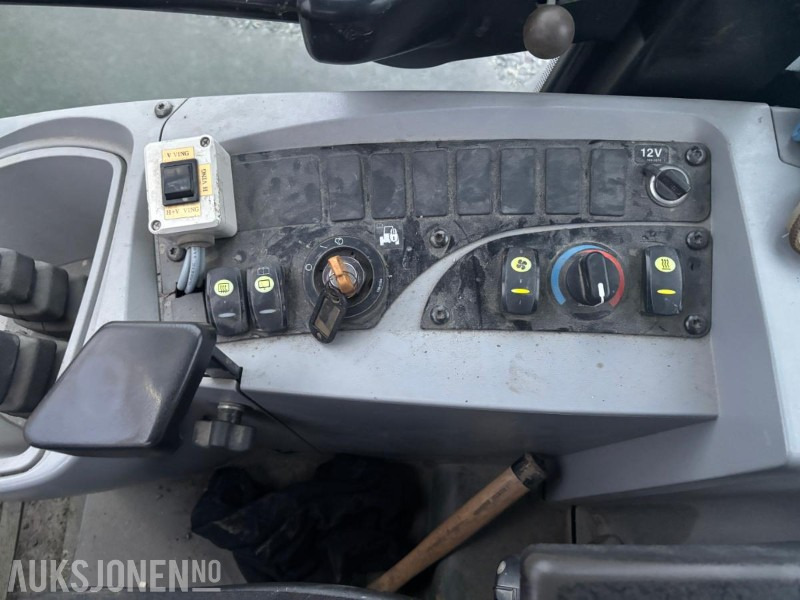 Chargeuse sur pneus 2010 CAT 906H HJULLASTER. 1596TIMER. SKUFFE. TELLEFSDAL VPL PLOG. HOLMS FEIEKOST. CAT PALLEGAFFLER