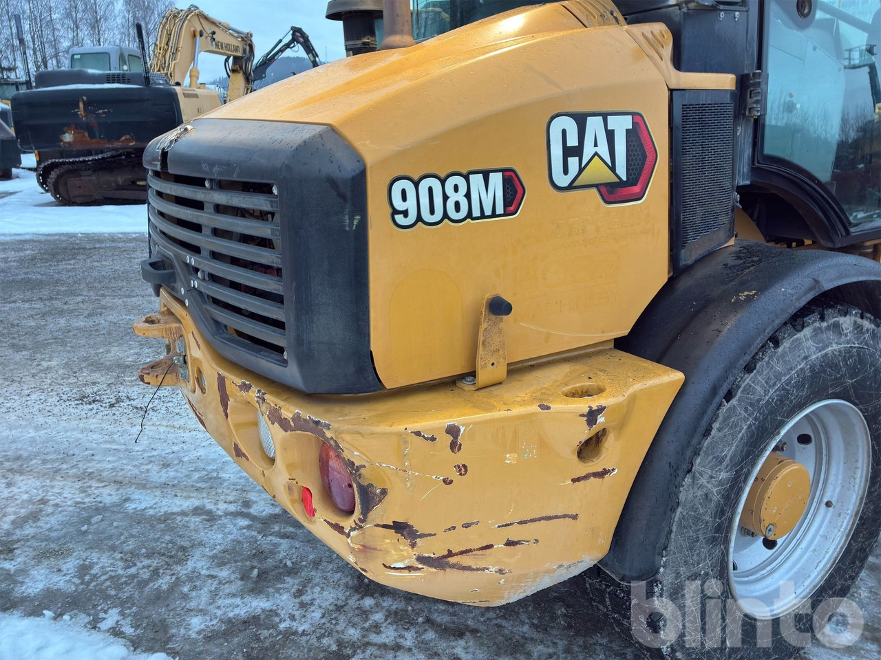 Chargeuse sur pneus CAT 908M