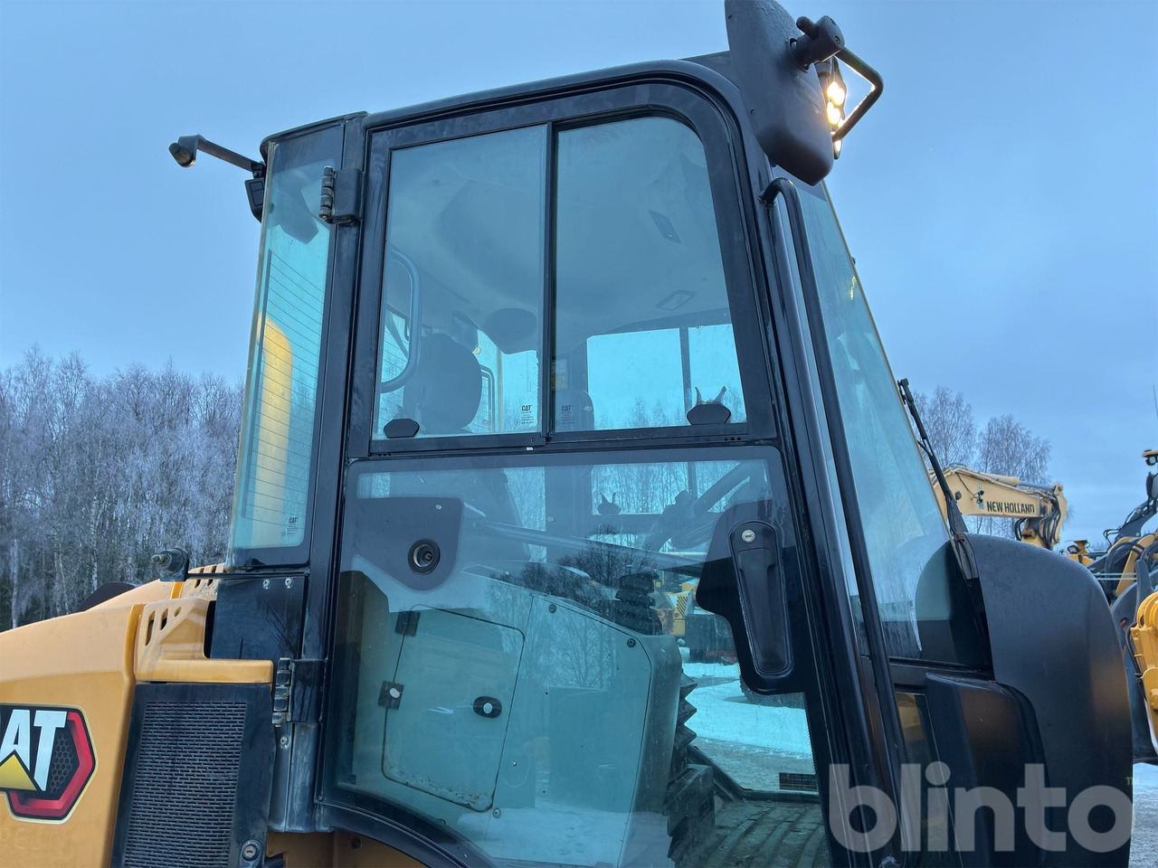 Chargeuse sur pneus CAT 908M