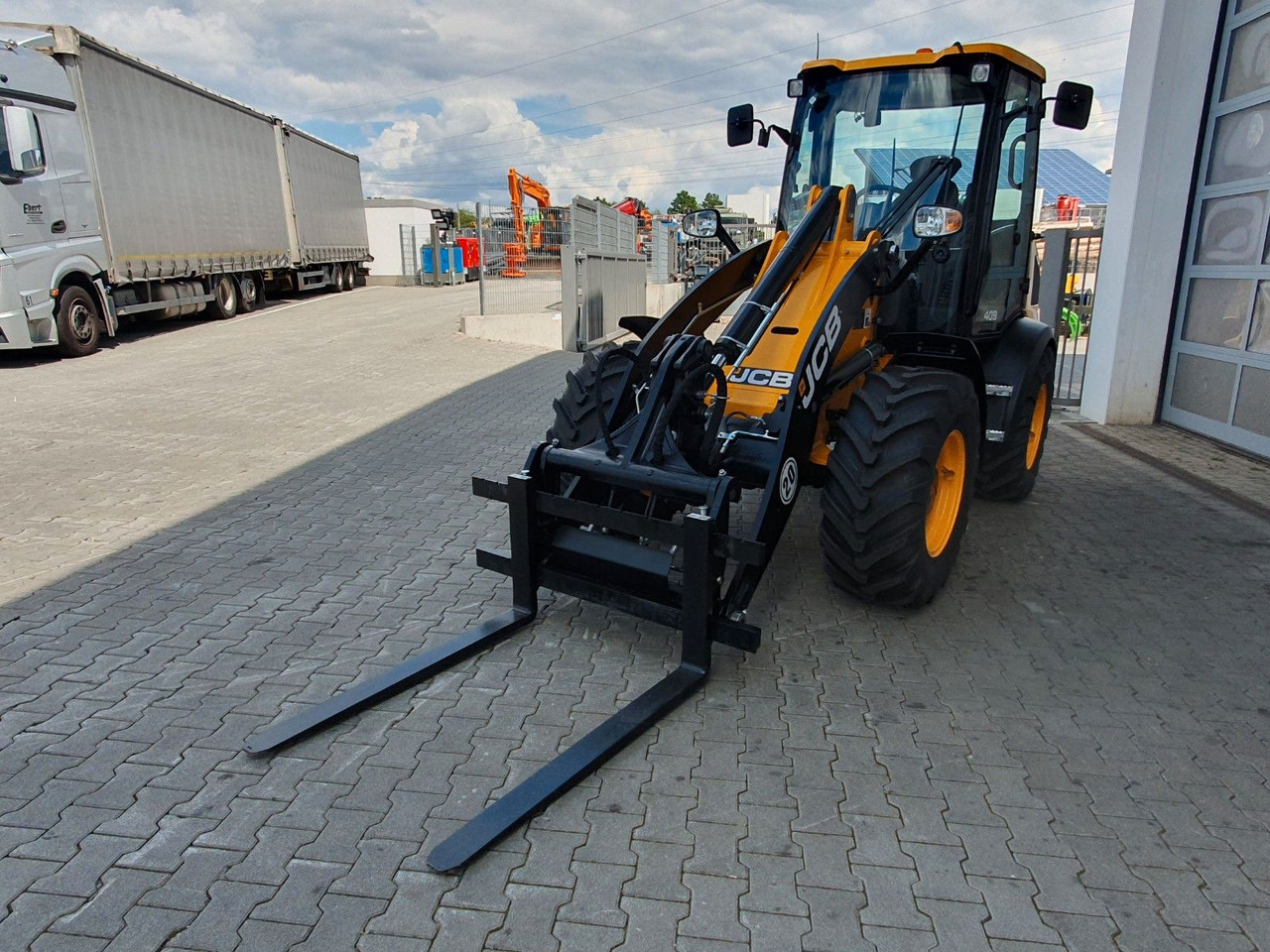 Chargeuse sur pneus JCB 409 SV / Neufahrzeug / Gabel