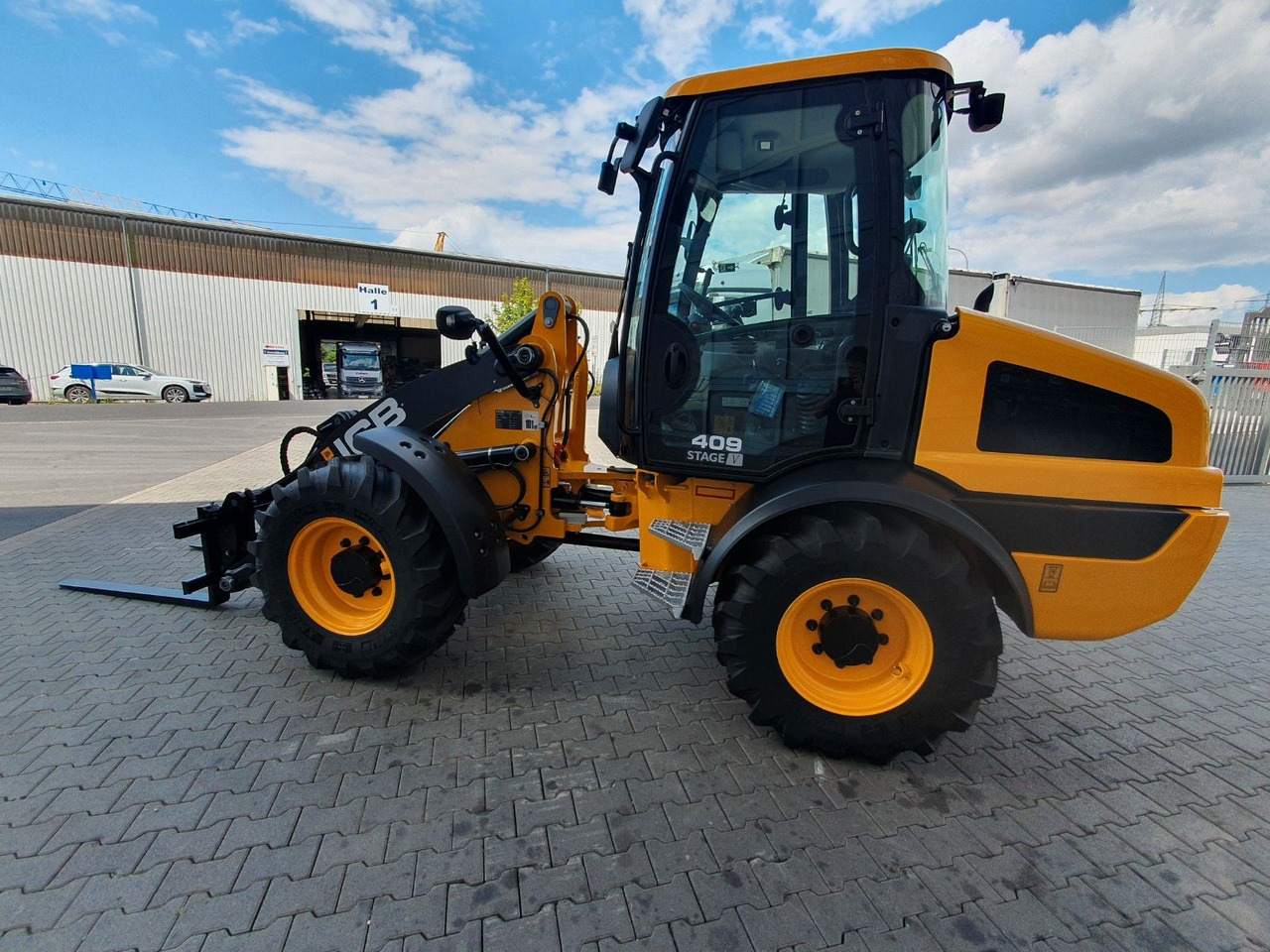 Chargeuse sur pneus JCB 409 SV / Neufahrzeug / Gabel
