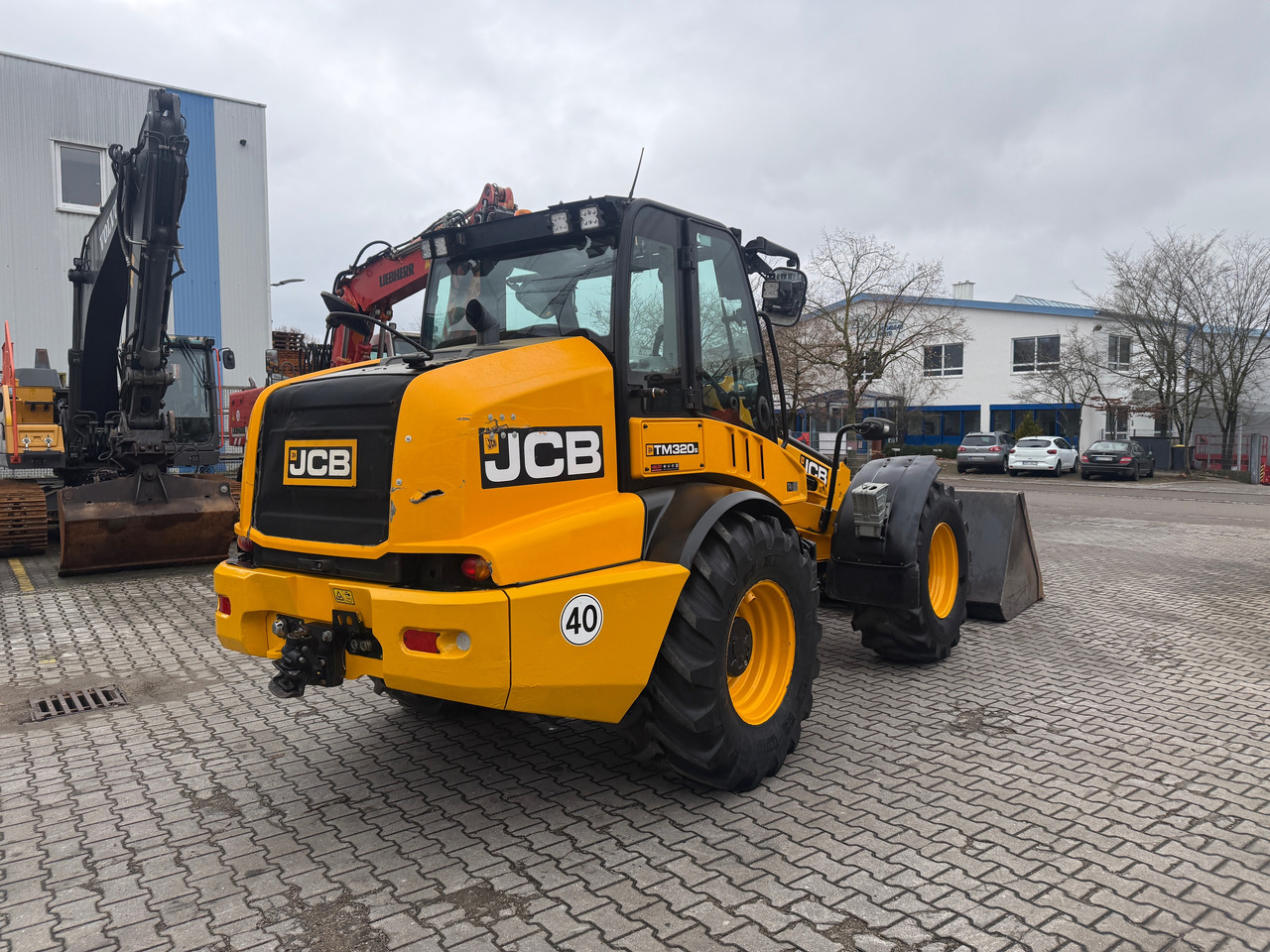 Chargeuse sur pneus JCB TM320S Teleskopradlader SW