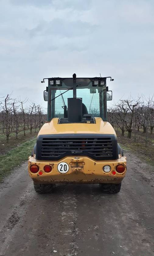 Chargeuse sur pneus Ładowarka Caterpillar 906H widły + łyżka