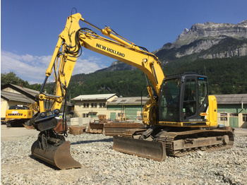 Pelle sur chenille New Holland E140CSR: photos 1