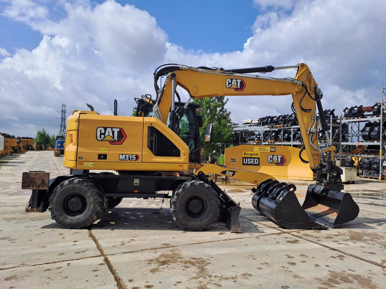 Pelle sur pneus CAT M315