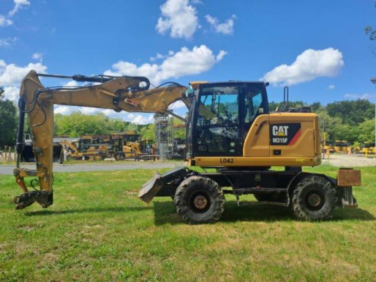 Pelle sur pneus CAT M315F IVC