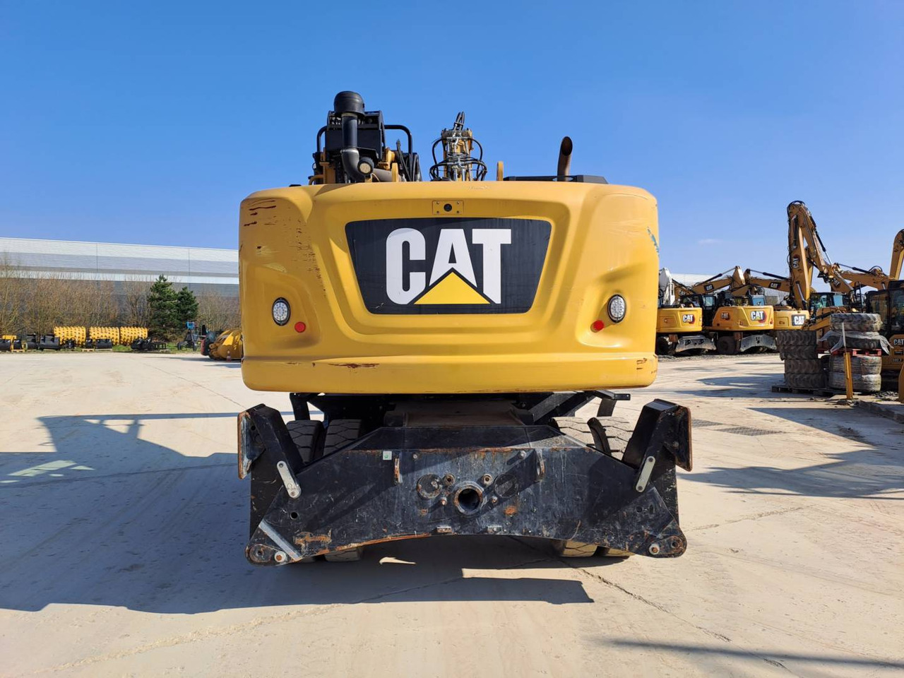 Pelle sur pneus CAT MH3022