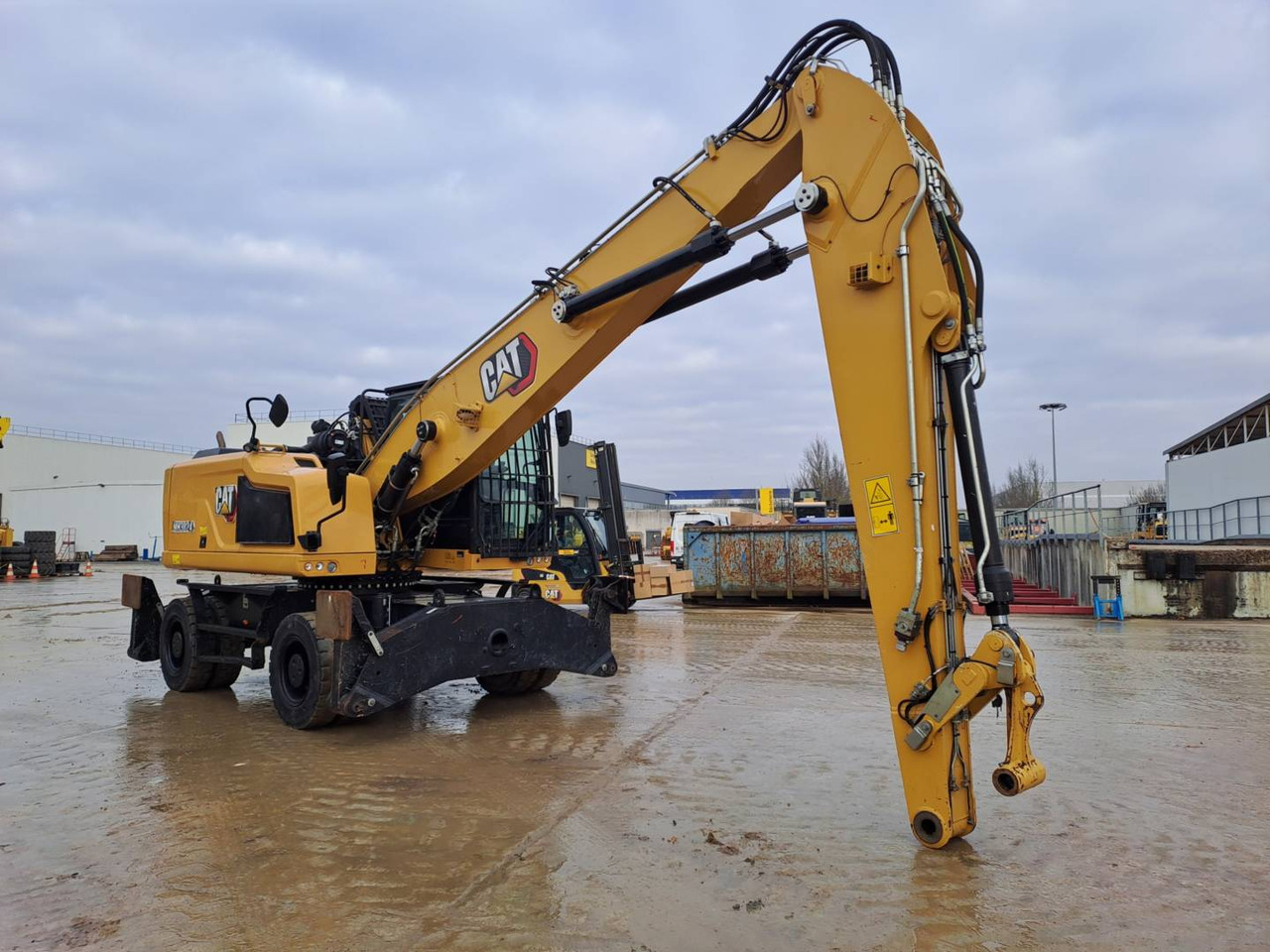 Pelle sur pneus CAT MH3024