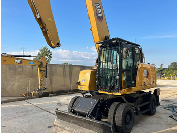Pelle sur pneus CAT MH3024-1