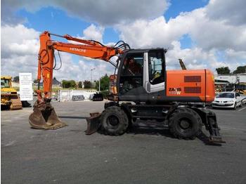 Pelle sur pneus Hitachi ZX140W-3