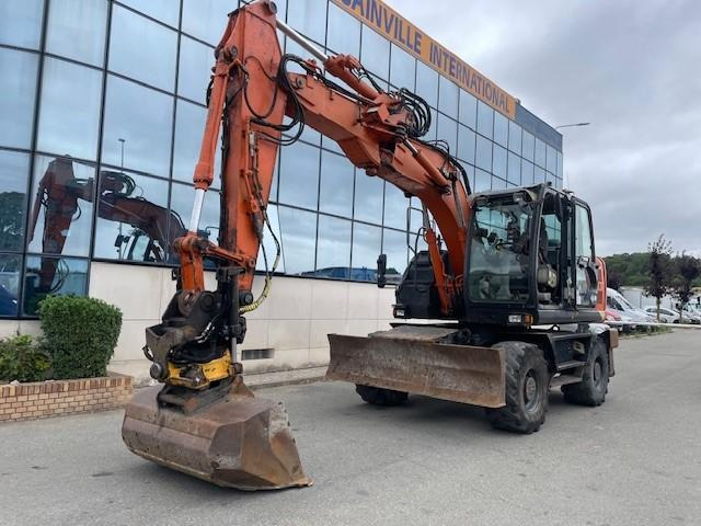 Pelle sur pneus Hitachi ZX140W-5B