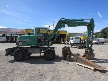 Pelle sur pneus Liebherr A 311 Litronic