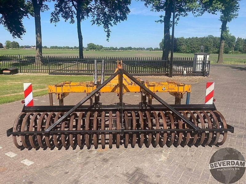 Charrue Veenhuis woeler met packer