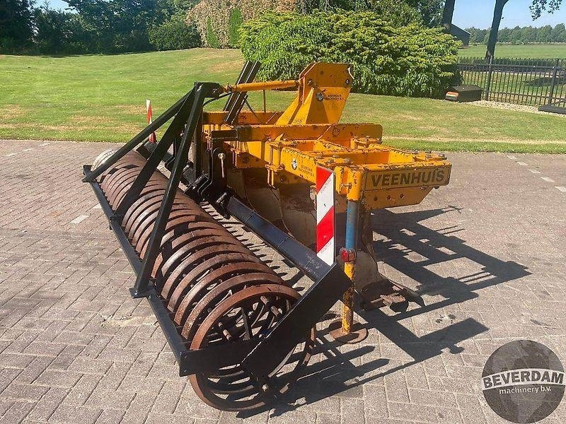 Charrue Veenhuis woeler met packer