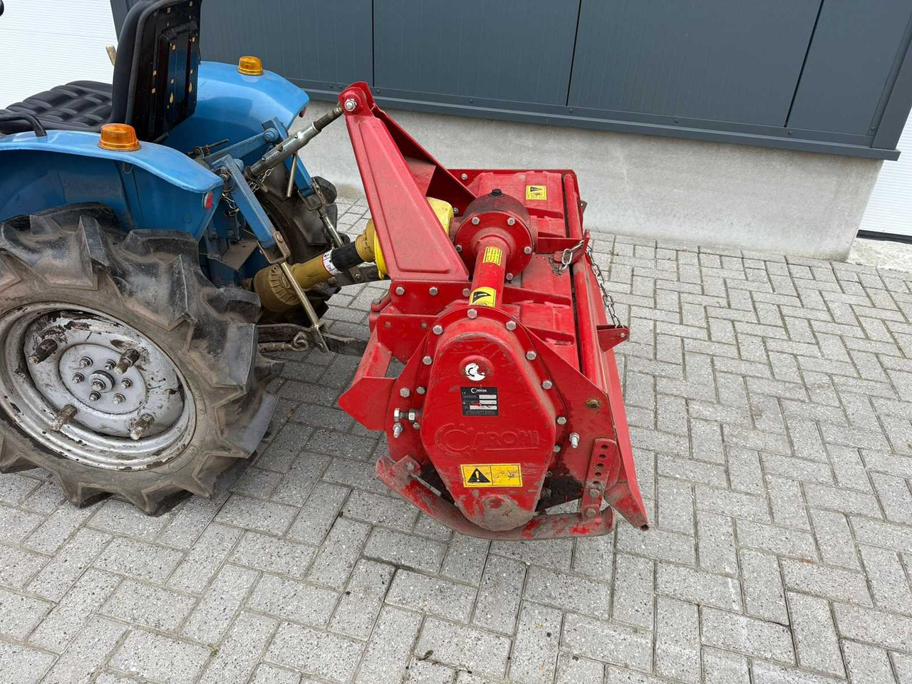Micro tracteur Hinomoto E-14 met Grondfrees