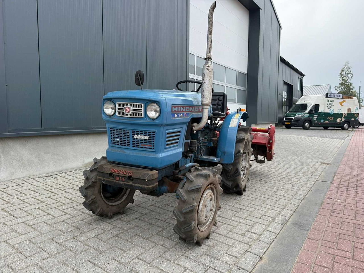 Micro tracteur Hinomoto E-14 met Grondfrees