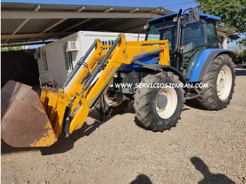 Tracteur agricole NEW HOLLAND TL 100: photos 1