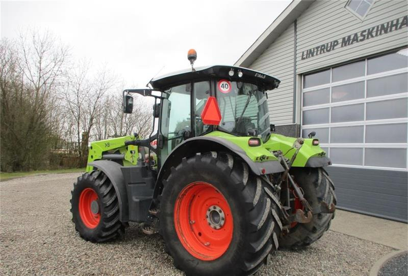 Tracteur agricole CLAAS ARION 650 C-Matic med frontlæsser, frontlift og fr