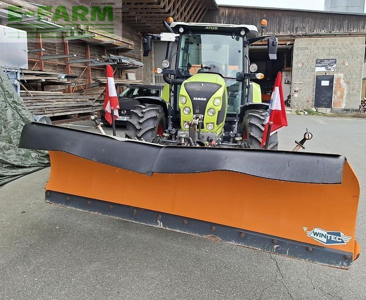 Tracteur agricole CLAAS atos 330 mit schneeschild/streuer