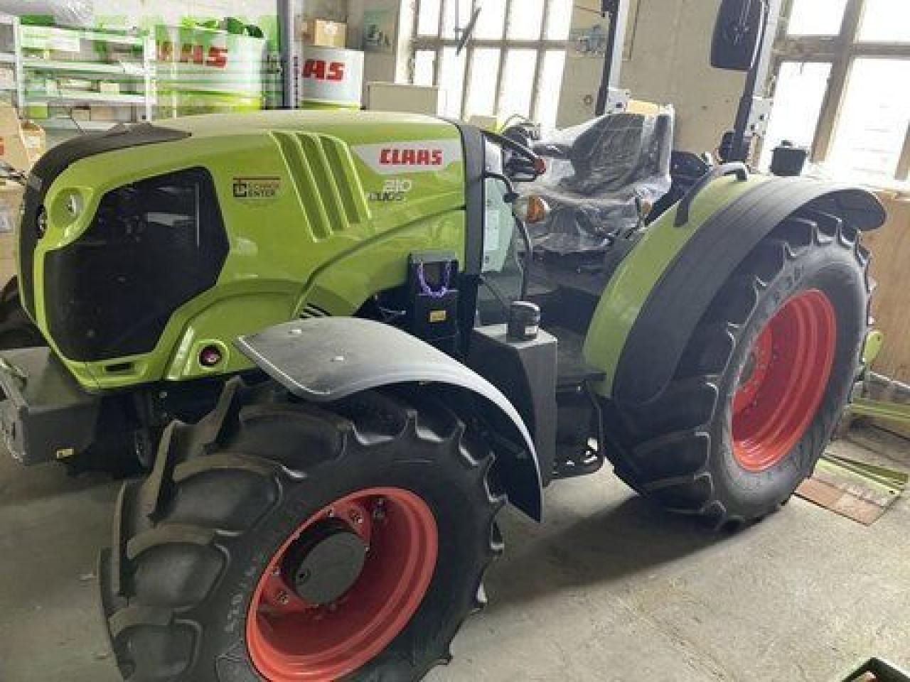 Tracteur agricole CLAAS traktor elios 210 cl plattf