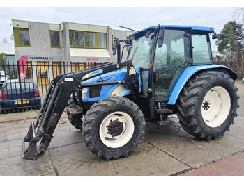 Tracteur agricole New Holland TL 100 A trekker tractor met front lader boom voor 