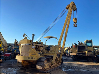 Poseur de canalisations CATERPILLAR