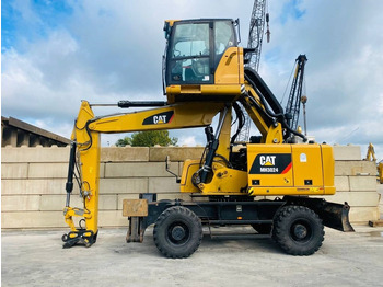 Pelle de manutention CATERPILLAR MH3024