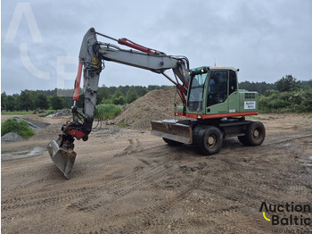 Pelle sur pneus VOLVO EW140C