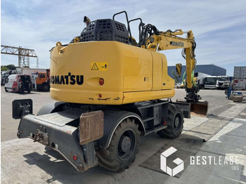 Pelle sur pneus Komatsu PW148-11: photos 3