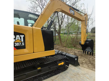 Engins de chantier Caterpillar 307.5: photos 3