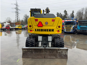 Pelle sur pneus LIEBHERR 910 Compact Litronic Powertilt: photos 5