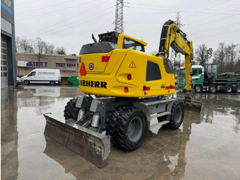 Pelle sur pneus LIEBHERR 910 Compact Litronic Powertilt: photos 4
