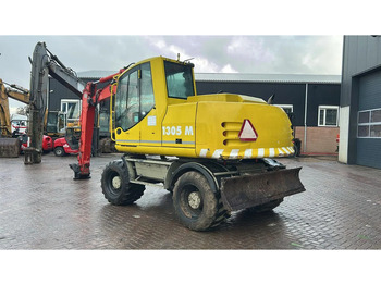 Pelle sur pneus Atlas 1305: photos 4 Pelle sur pneus Atlas 1305: photos 4