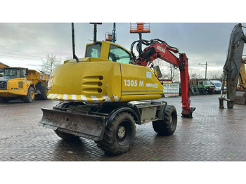 Pelle sur pneus Atlas 1305: photos 3 Pelle sur pneus Atlas 1305: photos 3