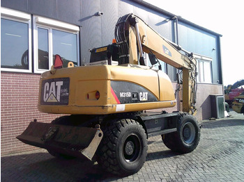 Pelle sur pneus Caterpillar M315D: photos 3