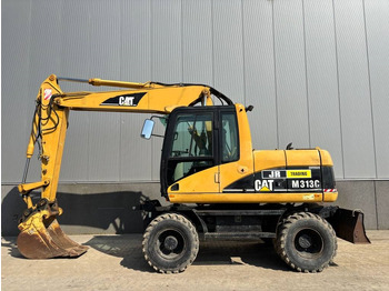 Pelle sur pneus CATERPILLAR M313C