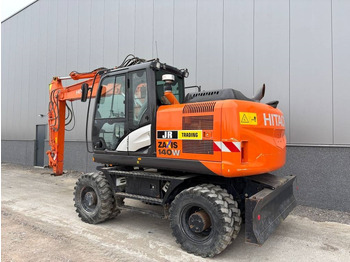 Pelle sur pneus Hitachi ZX 140 W-5B: photos 3